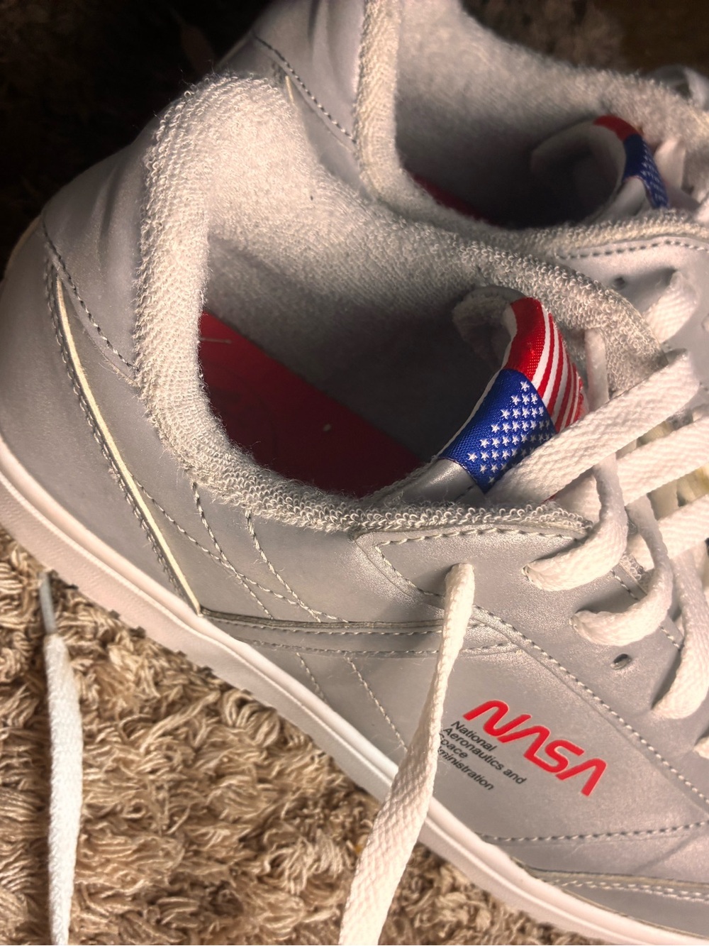 the NASA "Captain" Retro Reflective Low-Top Sneakers.